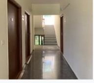 ISI Guest House — internal staircase and corridor