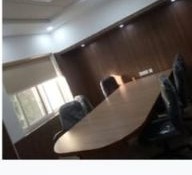 IIA — conference room with wood panelling and integrated AV