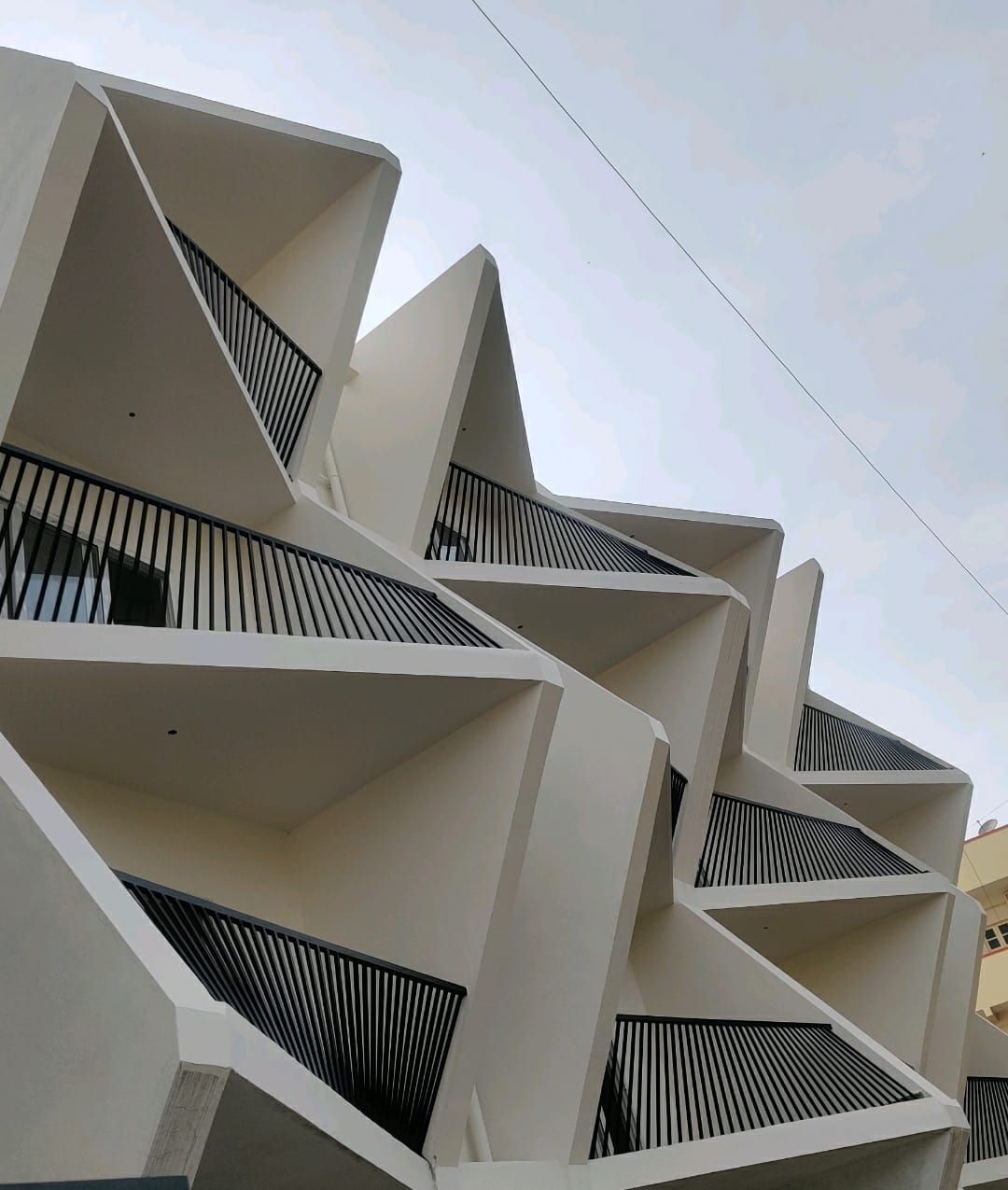 White Lion Residences — twin-block elevation in daylight